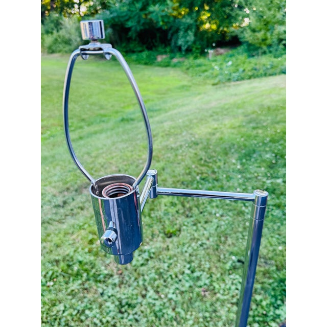 Vintage 1970s Chrome Floor Lamp With Extendable Arm by Hinson Lamp Co. Bring iconic 1970s style into your home with this...