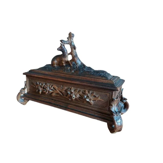 Black Forest jewelery box with Reg Fine well carved, structure very good condition, walnut wood The upholstery show sign...