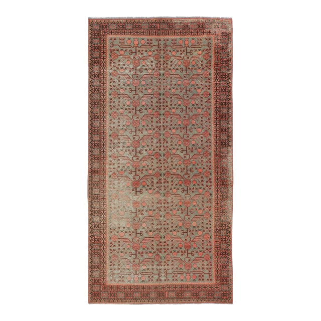 Antique 20th Century Khotan Runner With Pomegranate Motifs & Lattice - Rug & Kilim For Sale