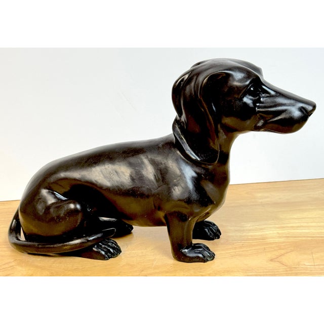 French School Patinated Bronze Dachshund Sculpture This finely cast French School patinated bronze dachshund sculpture...
