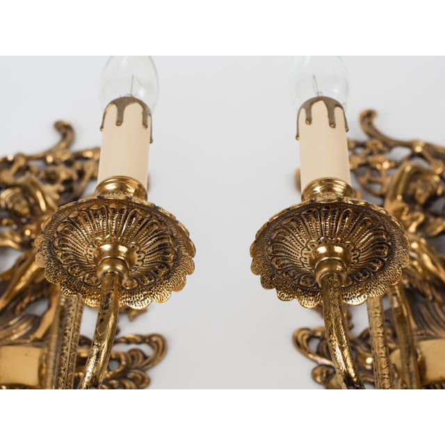 Spanish Revival 1950s Spanish Empire Cast Brass Winged Goddess Nike Victory 2-Light Wall Sconces - A Symmetrical Pair For Sale - Image 3 of 12