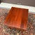 A vintage Knob Creek Traditional American Shaker solid cherry rectangular side table having one double tall dovetailed...