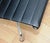 Office armchair EA124 by Charles & Ray Eames for Vitra. Structure in chromed aluminum and seated and back in black tinted...
