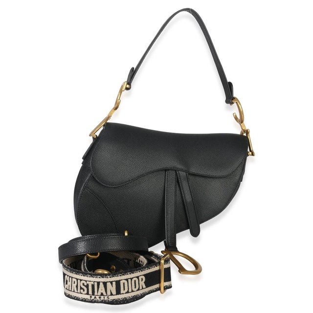 Designed by John Galliano in 1999, Dior's saddle bag made its debut on the SS00 runway. The cowboy-inspired accessory has...