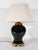 A robust, hand-painted and richly glazed table lamp atop a pierced, gilded metal base. Surmounted by a custom, pleated,...
