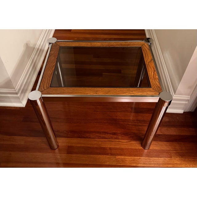 Vintage 1970s Milo Baughman style side table combining warm oak, polished chrome and removable smoked glass. The square...