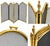 A beautiful antique fireplace screen with a four-panel brass frame and dark mesh panels. The curved design, warm brass...