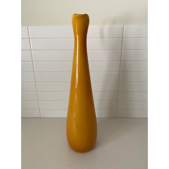 Wow. The height and elegance of this hand-blown work is truly special. There are some cracks where the upper handle meets...