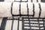 Clean lines, sharp contrast, effortless sophistication. This hand-knotted Moroccan rug features a striking linear...