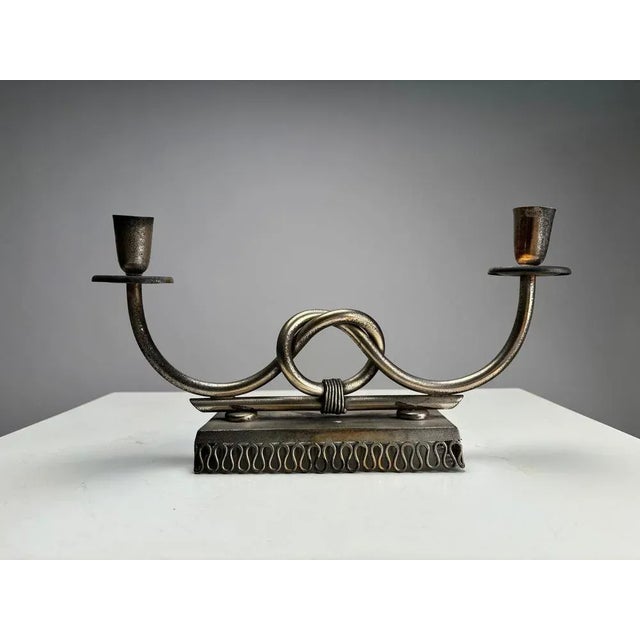 Important Mid-Century metal candlestick, Gio Ponti Style, Italy 1950s The Candlestick, of great refinement, proposes in...
