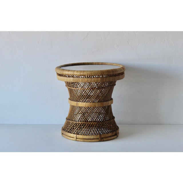 All handwoven wicker and rattan drum table, drink table with fitted smoked glass insert in Bohemian period style. In good...