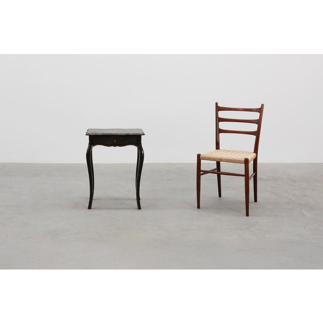 A charming 19th‑century French side table, this petite piece combines elegance with the quiet character of age. Crafted in...
