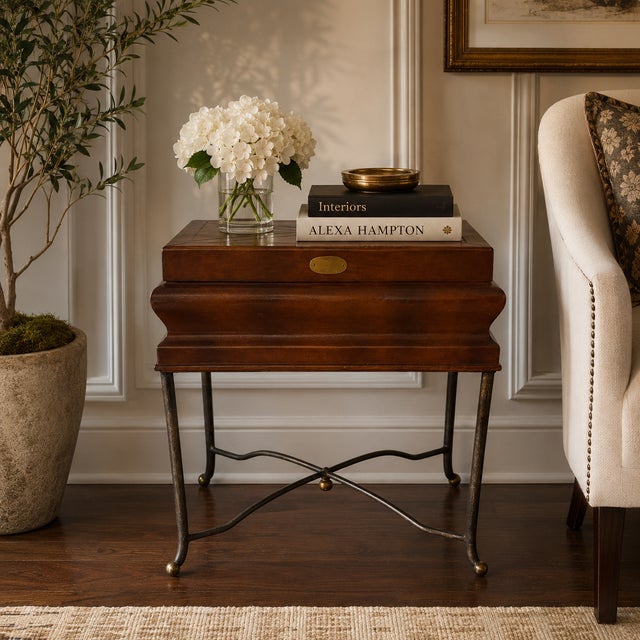 An elegant English Regency Revival storage side table featuring a hinged rectangular top with geometric line inlay and a...