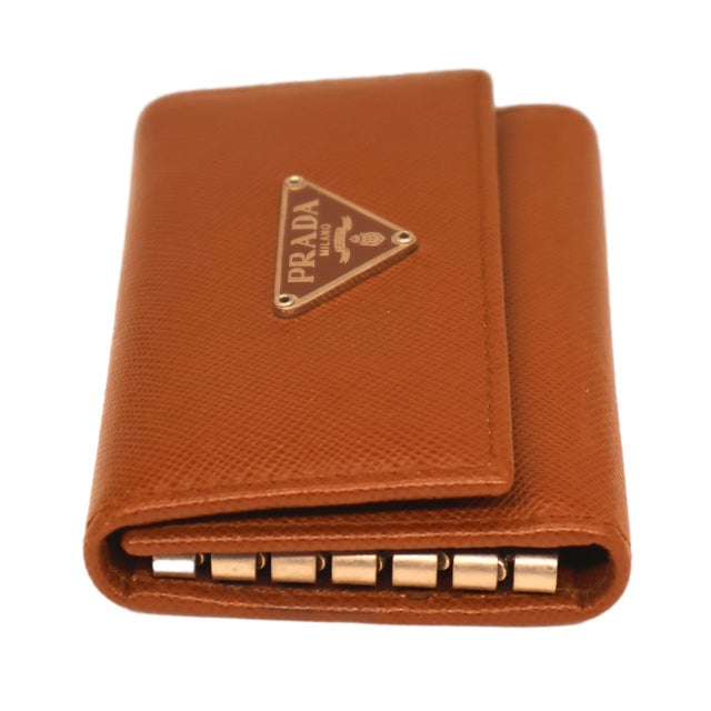 Prada Tobacco Saffiano Leather Portamon Key Case and Card Holder Wallet, 2016. The "Portamon," Italian for "card holder,"...