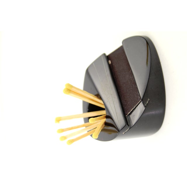 Consisting of 2 hooks, 1 candlestick, 1 ball candle, 1 ashtray, 1 glow extinguisher, 1 matchbox with friction surface,...