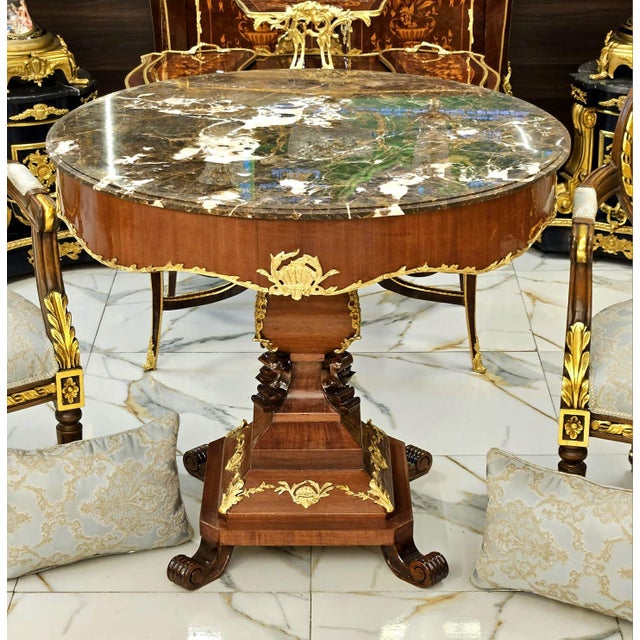 Make a statement in your living room with this breathtaking luxury round center table, masterfully crafted from premium...