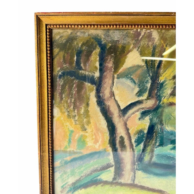 An early 20th century pastel drawing of a wooded landscape by American artist Bernard Gussow (1881-1957). The colors and...