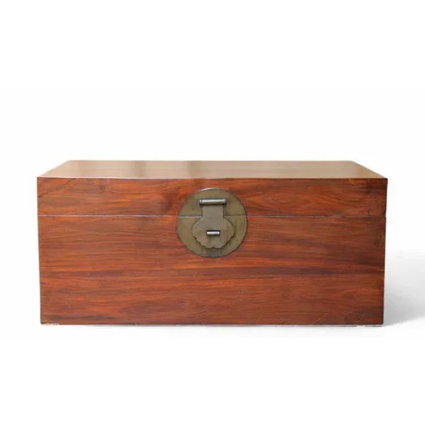 This vintage trunk from Shanxi, China, handcrafted with care from rich black wood. Its stunning natural wood grain is...