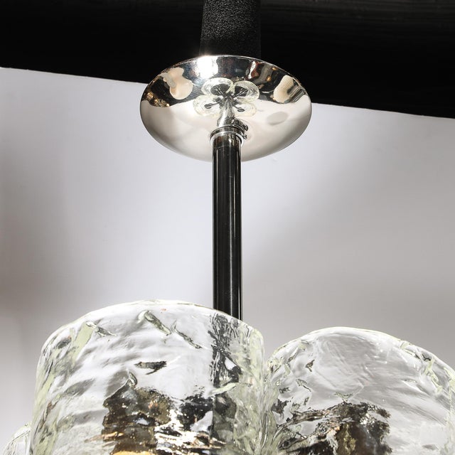 This hand-blown Murano glass chandelier, crafted by Mazzega in Italy around 1980, is a bold expression of Mid-Century...
