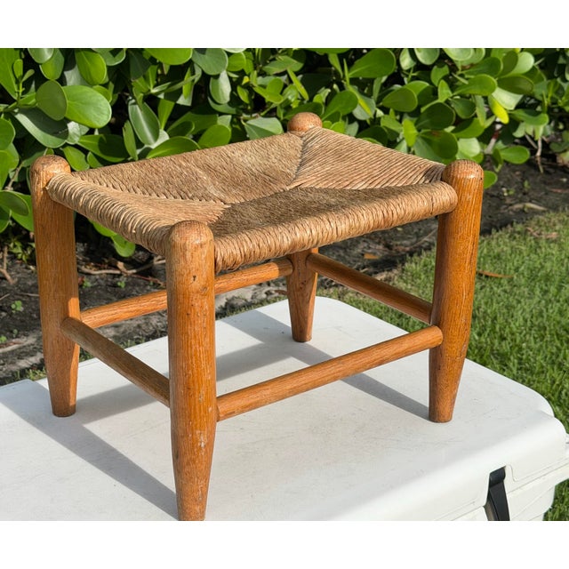 Great vintage woven rush seat footstool with a sturdy wooden frame and a beautiful warm, aged finish. The rush seat...