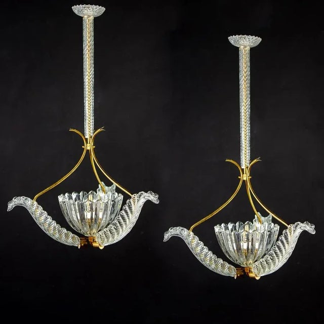 Elegant pair of liberty brass-mounted pendants by Ercole Barovier, 1940s. Each with three precious Murano glass leaves...