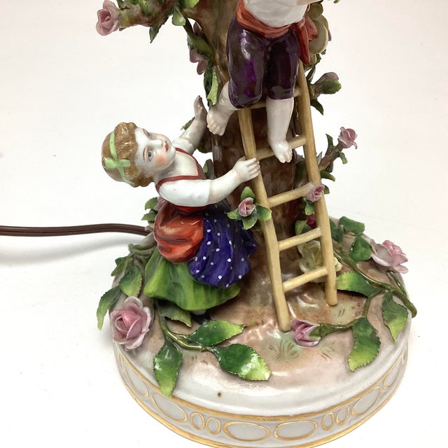 Charming early Von Schierholz German porcelain table lamp, beautifully detailed with the delicate hand-applied florals the...