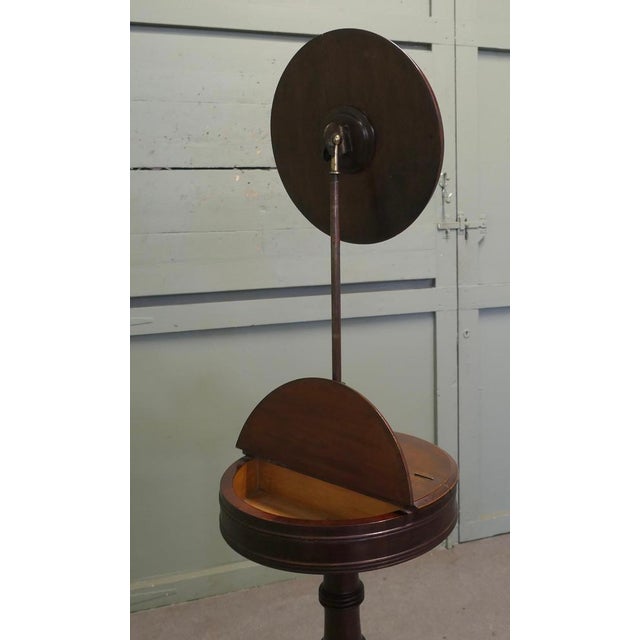 Victorian Telescopic Round Shaving Mirror on a Stand The circular bevelled mirror has a moulded surround that sits on a...