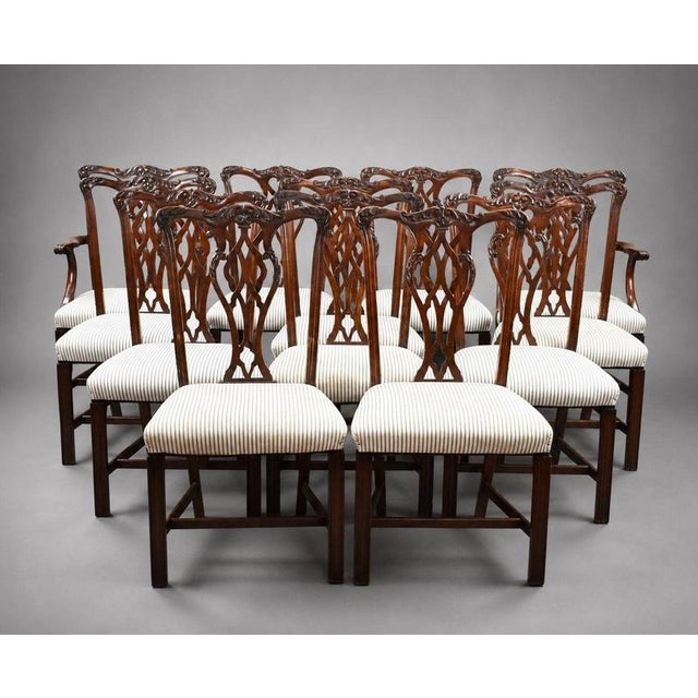 Edwardian Mahogany Extending Dining Table & 12 Chippendale Style Chairs Item Code: LC1456 A substantial and impressive...