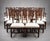 Edwardian Mahogany Extending Dining Table & 12 Chippendale Style Chairs Item Code: LC1456 A substantial and impressive...