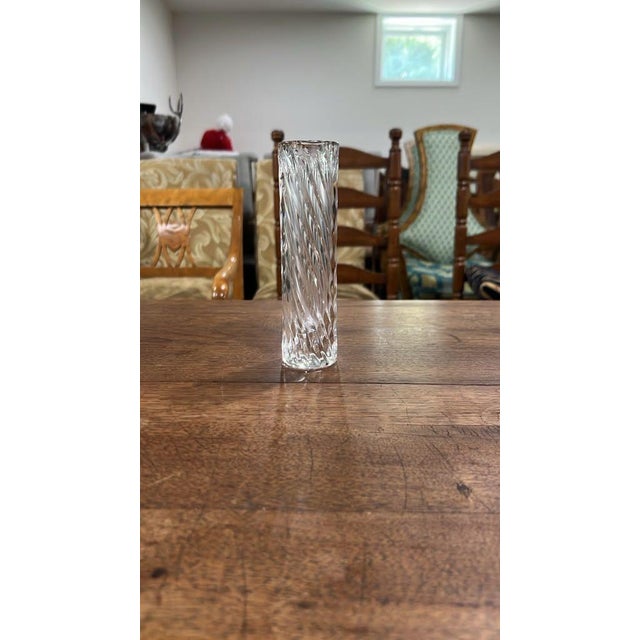 A sleek vintage Orrefors Swedish crystal cylindrical bud vase featuring an elegant twisted rib/swirl optic design. Retains...