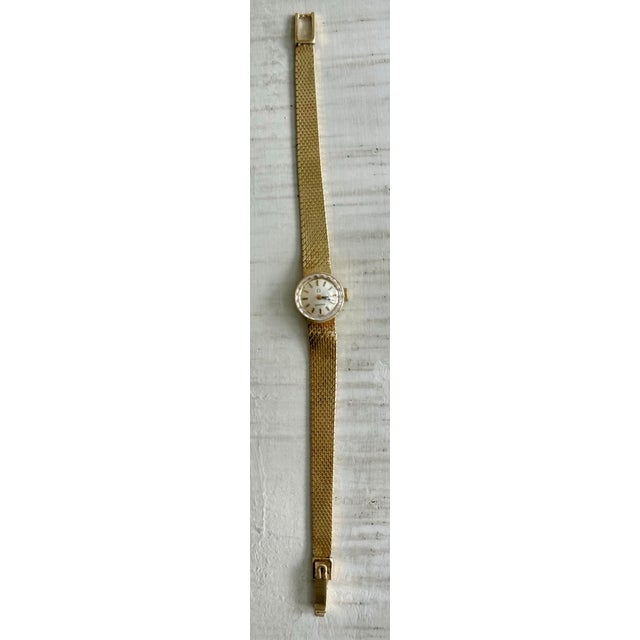 Rare Vintage 14 Karat Gold Ladies Omega Dress Wristwatch, Circa 1968 With Manual Wind-Up & Woven Gold Mesh Band by Premier Swiss Maker Omega For Sale - Image 9 of 12