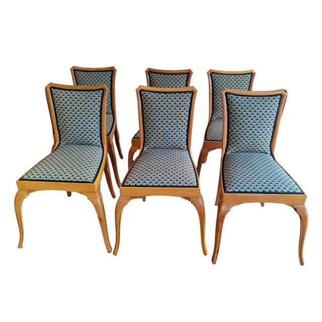 A superb set of six art deco dining chairs crafted in warm, finely grained pear wood, originating from germany, circa...