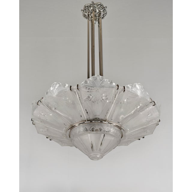 Marius Ernest Sabino A large French art deco chandelier by Marius Sabino. Made around 1925 - 1930 in nickel plated solid...