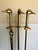 This vintage brass fireplace tool set features wonderfully sculptural duck head handles paired with a sleek geometric...