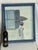 A charming vintage figurative painting on stretched canvas. Painting depicts a woman beneath an umbrella against a softly...