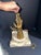 Antique brass wall mounted pull bell used as a monastery bell.the is a striking angel on the front of the bracket. It has...