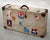 A rare Hermès suitcase dating from the 1920s, marked by travel and covered in numerous stickers from period hotels and...