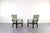 This pair of armchairs and a coffee table were made in Denmark in the 1970s. The wooden elements are made of solid ash...