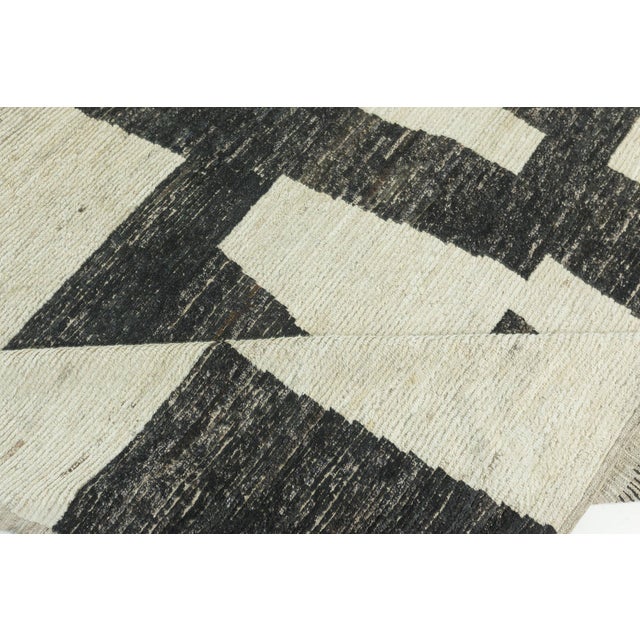 Modern Afghan Hand-Knotted Wool Rug by Doris Leslie Blau Size: 13'10" × 19'2" (421 × 584 cm) A striking example of...