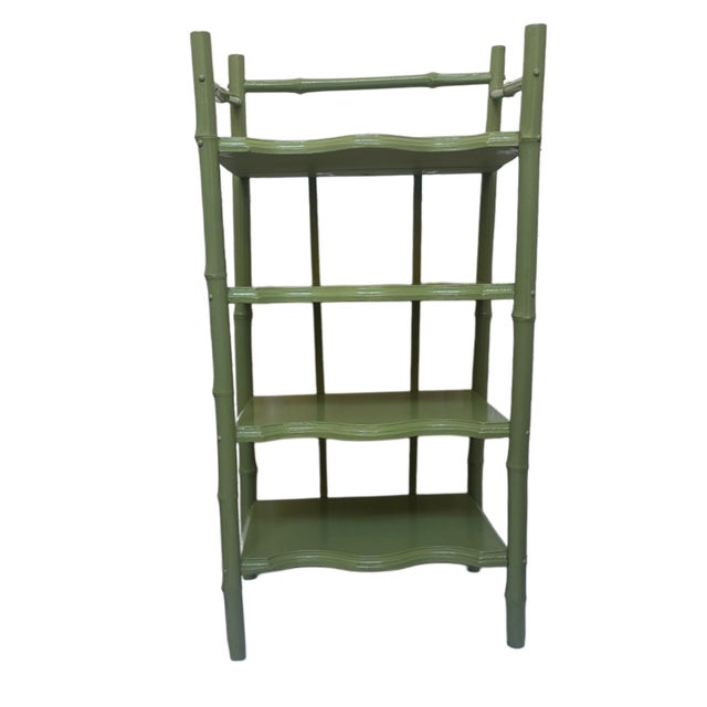 A sculptural bamboo‑style étagère finished in a custom Calke‑Green high‑gloss lacquer, offering a refined color statement...