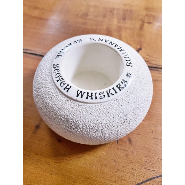 An antique English stoneware match strike, made to be used in a pub to advertise whisky. In excellent condition for it's...