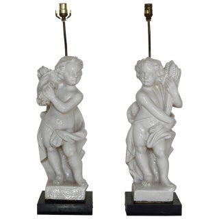 20th Century Pair of White Glazed Terracotta Cherub Lamps on Wooden Bases For Sale