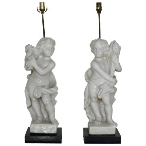 20th Century Pair of White Glazed Terracotta Cherub Lamps on Wooden Bases