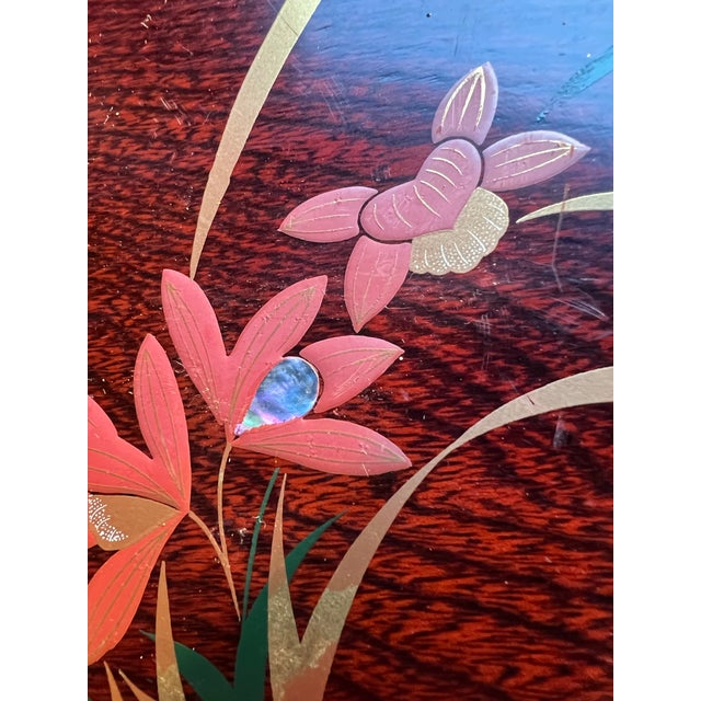 Up for consideration is a beautiful vintage round wooden Asian style tray with floral accents. This would look lovely in...