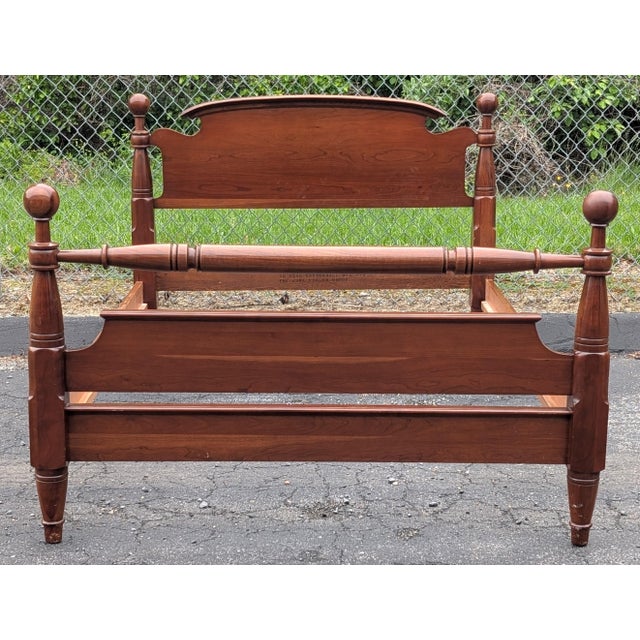 This exceptional 1960s vintage John Vogler cannonball full bed frame brings timeless Early American elegance to the modern...