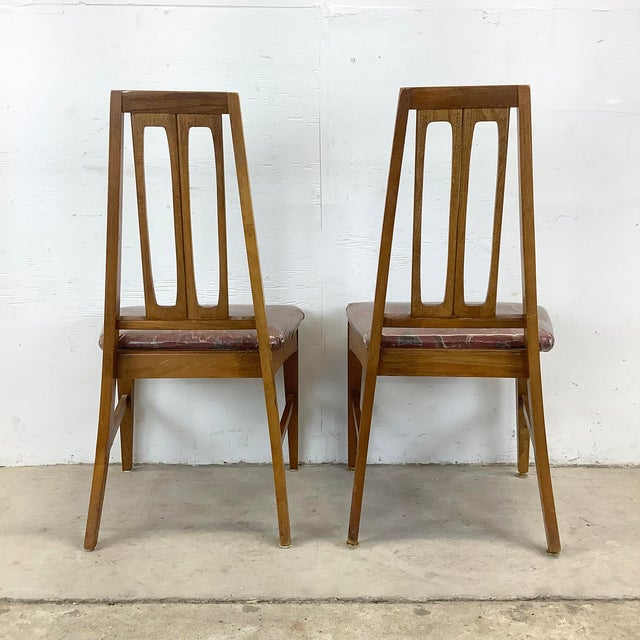 This exceptional set of six dining chairs attributed toYoung Manufacturing represents the pinnacle of 1960s American...