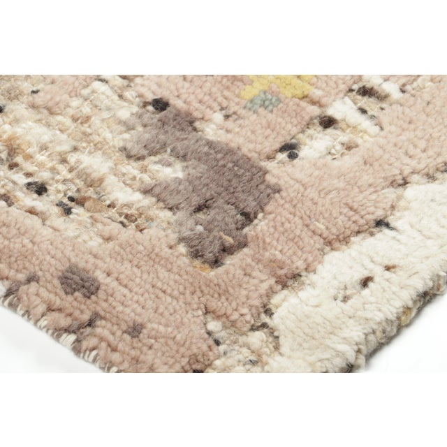 Hand-knotted in wool, this 2x3 contemporary abstract gift-sized rug from Rug & Kilim’s Modern collection is a poetic study...