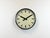 This wall clock was produced by International in Germany during the 1950s. It features a black metal frame, iron dial,...