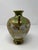An elegant antique Japanese Nippon porcelain cabinet vase dating to the early 20th century (circa 1905–1915). The twin-...