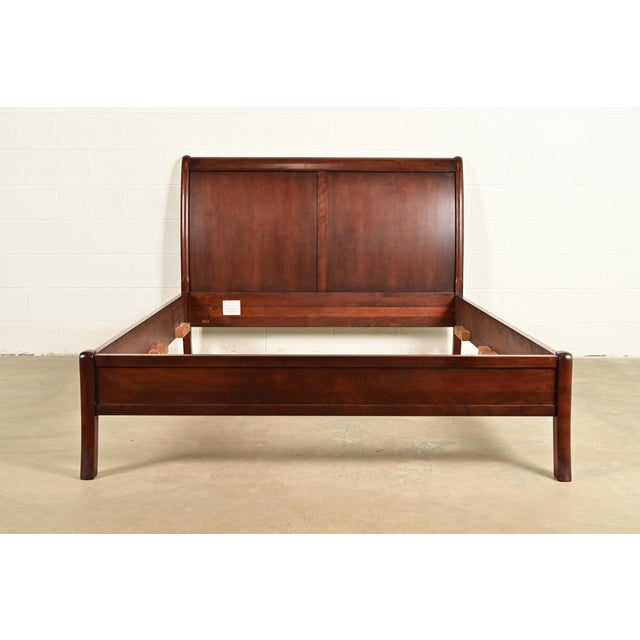 An outstanding French Empire or Louis Philippe style queen size sleigh bed By L. & J.G. Stickley USA, Early 21st Century...